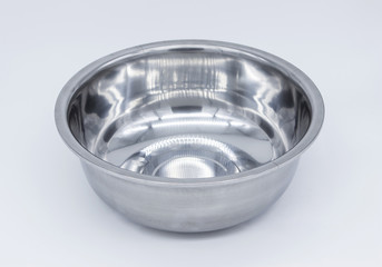 Metal kitchen bowl on white background.