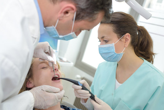 dentist female working with a patient