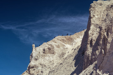Detail of the rock cliff sand dunes coastline in Denmark with blue sky. Rubjerg Knude Lighthouse, Lønstrup in North Jutland in Denmark, Skagerrak, North Sea