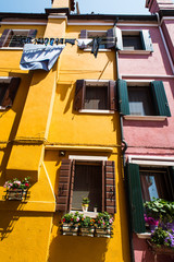 Fototapeta na wymiar Colored buildings of Venice against the sky