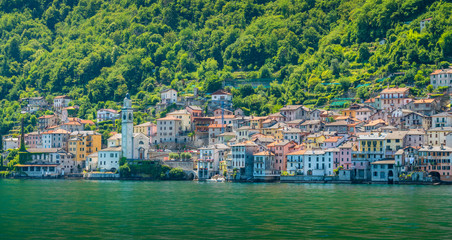 Fototapeta na wymiar Brienno as seen from the ferry, on the Como Lake, Lombardy, Italy.