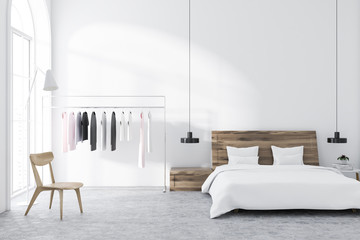 Luxury white bedroom interior, wooden bed