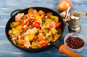 Mix of stewed vegetables in frying pan