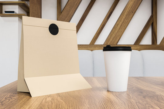 Breakfast In Paper Bag And Coffee To Go On Table