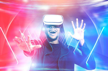 Happy man in vr glasses, glowing wormhole