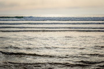 Tangier beach and waves and rocks