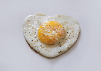 Heart Egg on white Plate