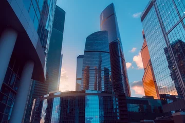 Foto op Plexiglas Moskou Wolkenkrabbers in het internationale zakencentrum van Moskou bij zonsondergang