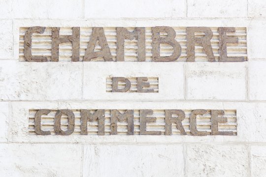 Chamber Of Commerce Sign In French On A Wall