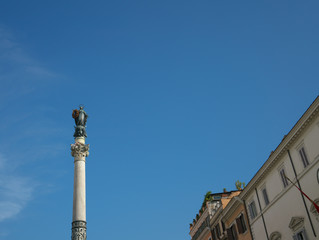 Fototapeta premium Rome,Italy-July 27, 2018: Column of the Immaculate Conception carrying a wreath of flowers 