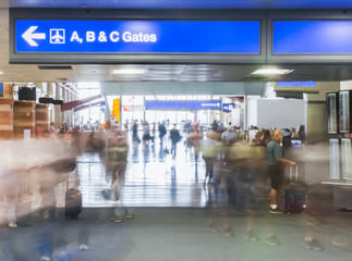 airport with busy blurred travelers