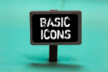 Text sign showing Basic Icons. Conceptual photo pictogram or ideogram displayed on a computer screen or phone Blackboard green background important message ideas communicate reflections.