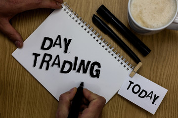 Writing note showing Day Trading. Business photo showcasing securities specifically buying and...