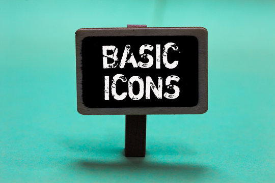 Text sign showing Basic Icons. Conceptual photo pictogram or ideogram displayed on a computer screen or phone Blackboard green background important message ideas communicate reflections.
