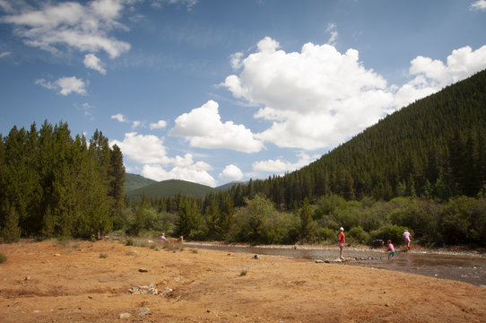 Kids Playing in a Creek or River, Colorado, Camping