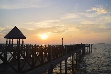 Fototapeta premium a jetty during sunrise