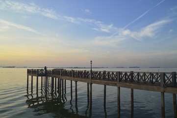 Fototapeta premium a jetty during sunrise