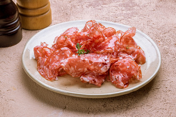 salami sliced on a plate