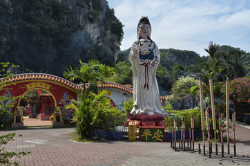 Guan Yin statue at Ling Sen Tong Cave Temple, Ipoh, Malaysia - Ling Sen Tong is a beautiful Taoist cave temple located at the foot of a limestone hill in Ipoh, Malaysia. © lcchew
