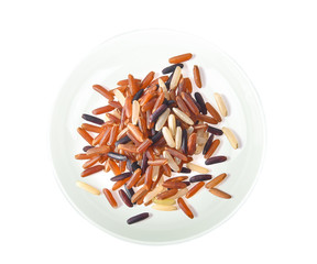 brown rice isolated in white plate on white background