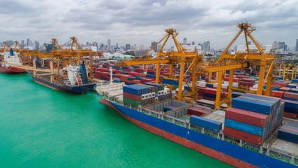 Fototapeta na wymiar Aerial view container ship from sea port for import export or transportation concept background.