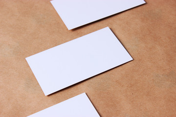 Business cards on a brown background.