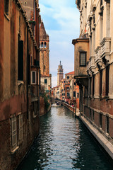 Fototapeta na wymiar Narrow Canals in Venice Italy