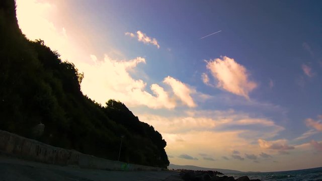 Timelapse of sky with airplane