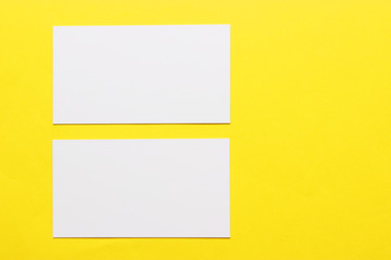 white business cards on a colored background.