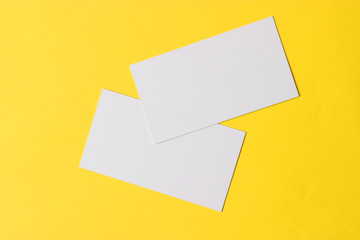 white business cards on a colored background.
