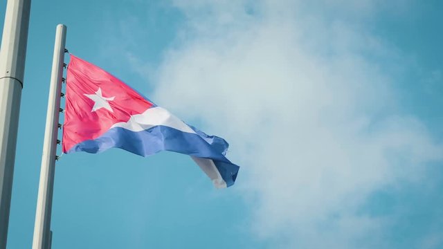 Cuba Waving Flag with Havana on background.
