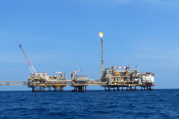 Offshore construction platform for production oil and gas, Oil and gas industry and hard work,Production platform and operation process by manual and auto function, oil and rig industry and operation.