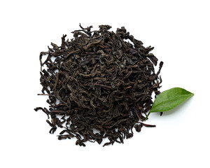 Dried black tea leaves isolated on white background. Top view.