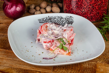 Delicious tomatoes with onios