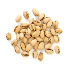Salted pistachios isolated on white background. Top view.