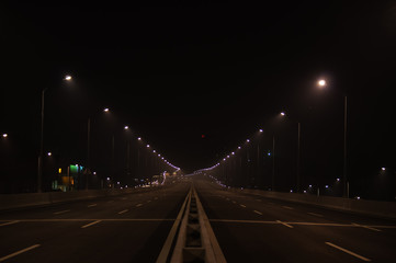 Fototapeta na wymiar Wide Road in the Light at Night