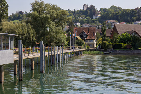Swiss town Mannenbach on the Rhine with hithe and Salenstein castle in the background