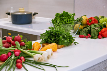 healthy foods are on the table in the kitchen.