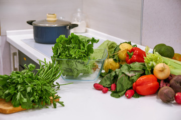 healthy foods are on the table in the kitchen.