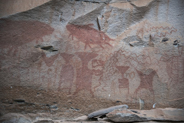 archaeology rock art is human-made markings placed on natural stone, The art is estimated to be 3,000 years old at Pha Taem National Park, Ubon Ratchathani Province, Thailand.