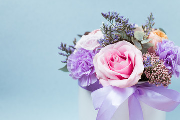 Closeup flowers background -blank greeting card or invitation with flowers in pink and purple tones