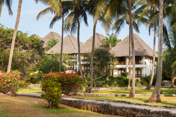 Relaxing huts in an African tropical resort,