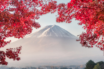 Mount Fuji with red Maple leaves cover in morning at Kawaguchiko lake