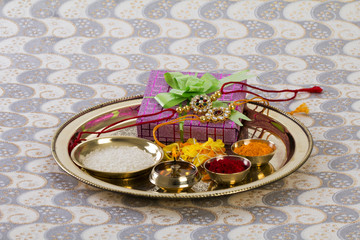 Raksha bandhan Rakhi with gift and flowers