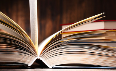 Composition with open book on the table