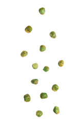 Green peas with salt falling isolated on white background.