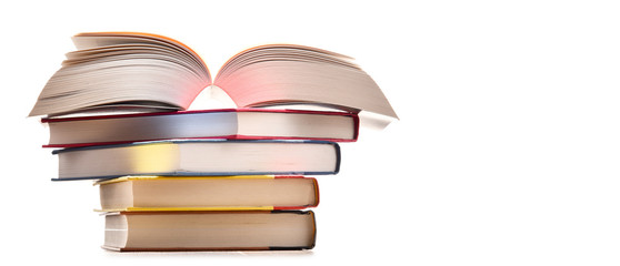 Composition with stack of books isolated on white