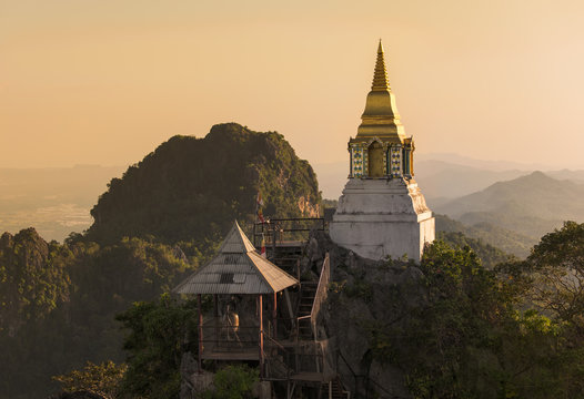 Lampang,Thailand.Old pagoda was built on hilltop. at sunset time. (Watchalermprakiat)