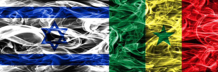 Israel vs Senegal smoke flags placed side by side. Israeli and Senegal flag together