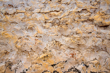 Close up clay wall for background or wallpaper, texture for decoration wall by vintage and retro style.